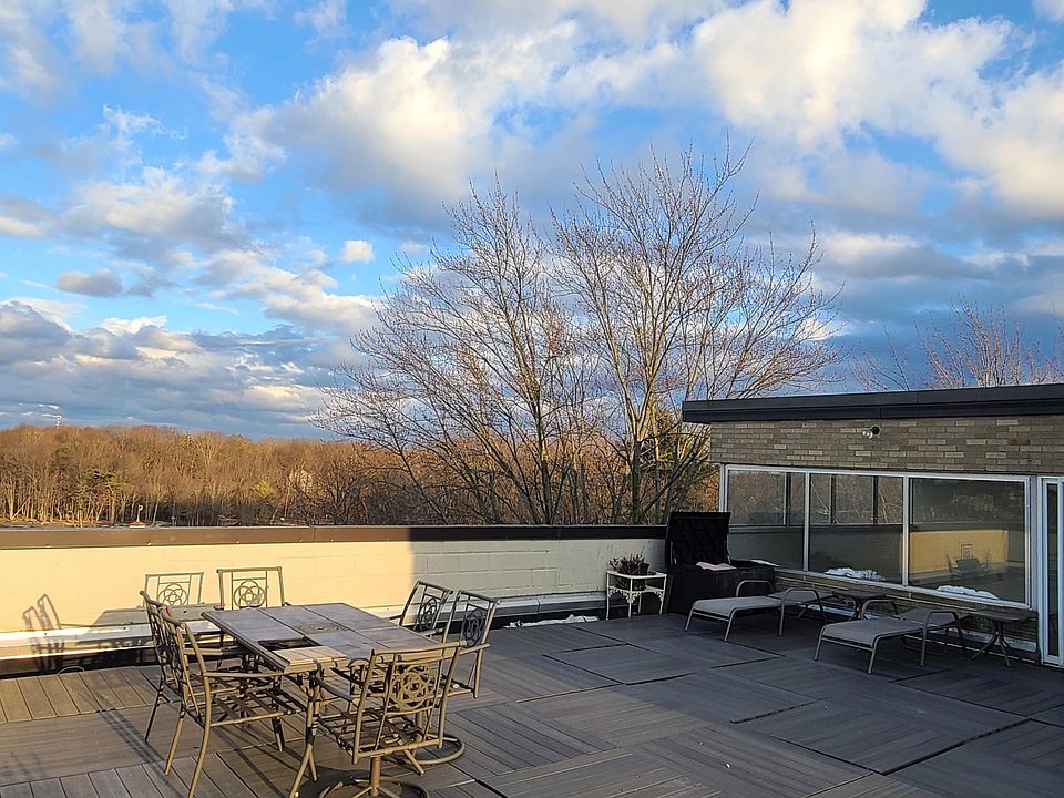 Private walkout rooftop patio.