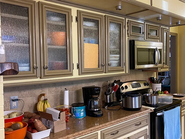 Kitchen stovetop/countertop area