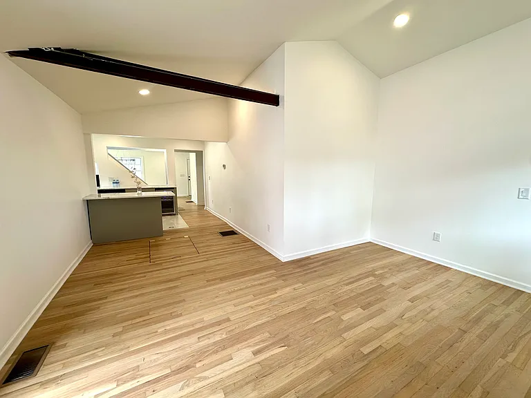Living room with vaulted ceiling