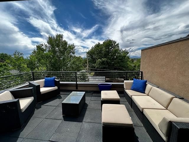 Fantastic west facing wrap around rooftop patio