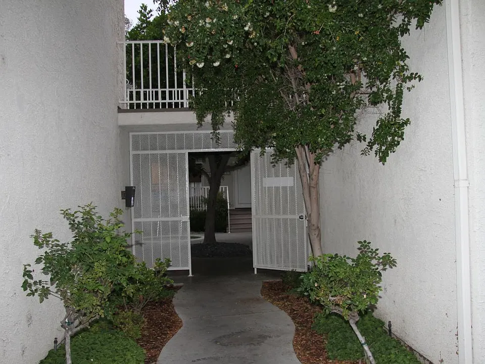 Secured courtyard entry with jacuzzi