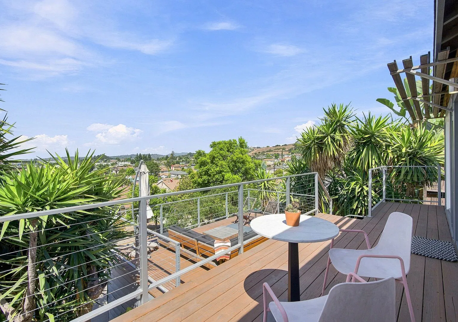 Charming Hillside Retreat with Modern Upgrades, Stunning City Views & Expansive Outdoor Living! — Photo 3