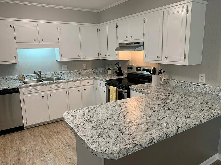 Plenty of counter space with extra seating option