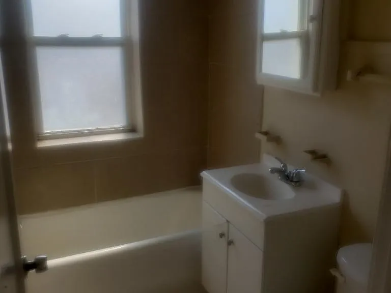 7852 S Eberhart Ave #202 — Photo 3