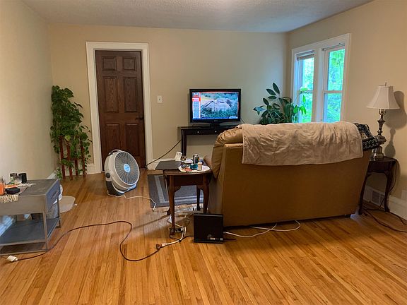 Spacious living room with beautiful hardwood floors.