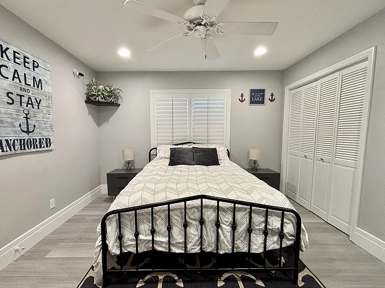 Downstairs bedroom with queen bed