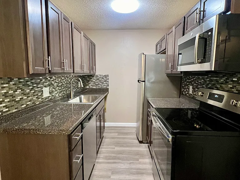 beautiful updated kitchen (microwave, dishwasher, garbage disposal, etc.)