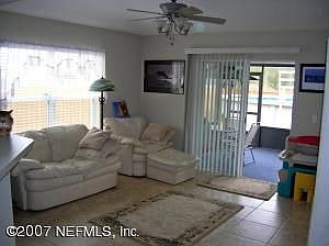 family room and entrance to screened in porch
