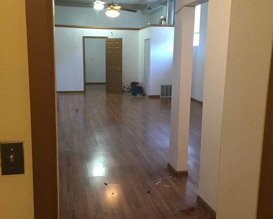 looking from kitchen thru living room to bedroom