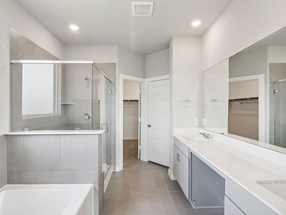 Primary bathroom at a home in Sundance Cove of Crosby.