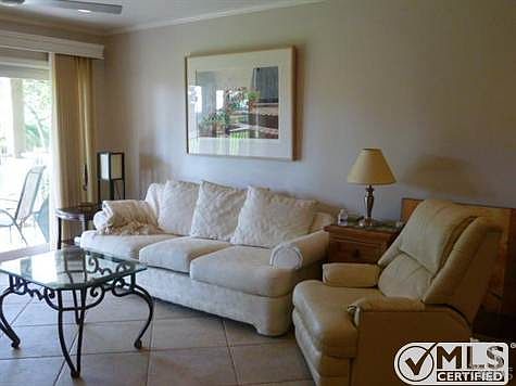 Beautiful living room looking out over lovely greenbelt and beyond to the ocean.  Surfside III  Bldg. 4, Port Hueneme, CA