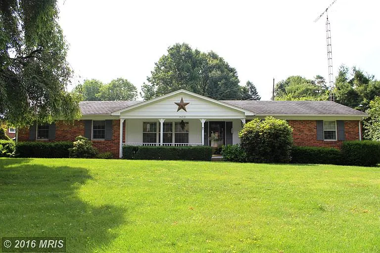 13719 Woodland Heights Dr photo 1
