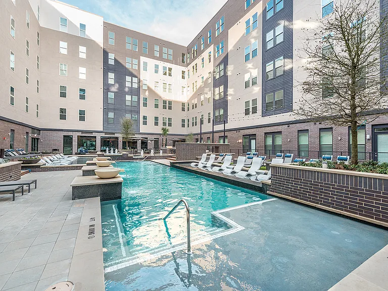The hotel-inspired pool with tanning ledge