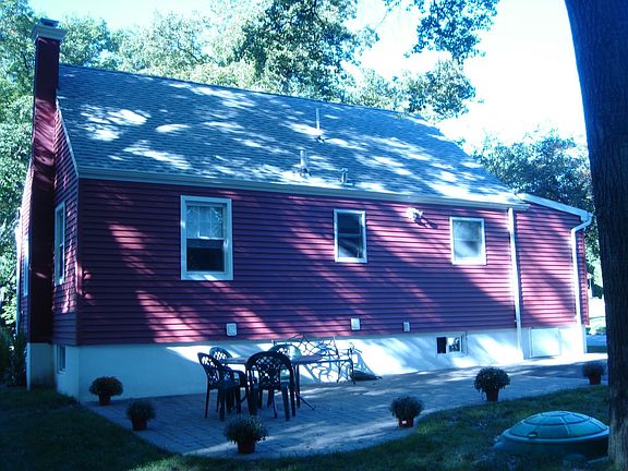 Brand new roof, siding, gutters and paver patio
