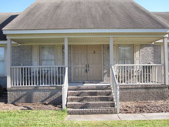 Relax with friends and neighbors on your large covered front porch.