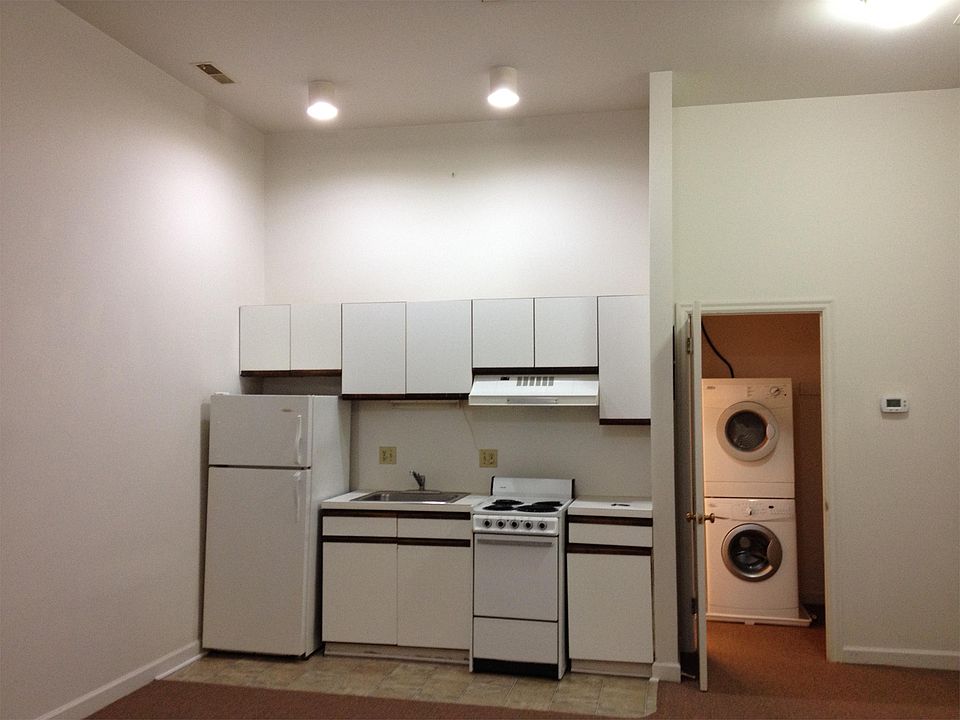 View from the front door. Turning left at the washer/dryer stack takes you into the bathroom