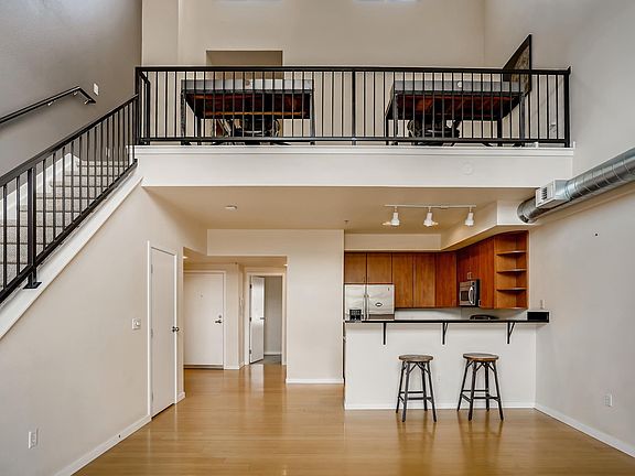 Large open Family Room leading to Kitchen and main floor bedroom & bath