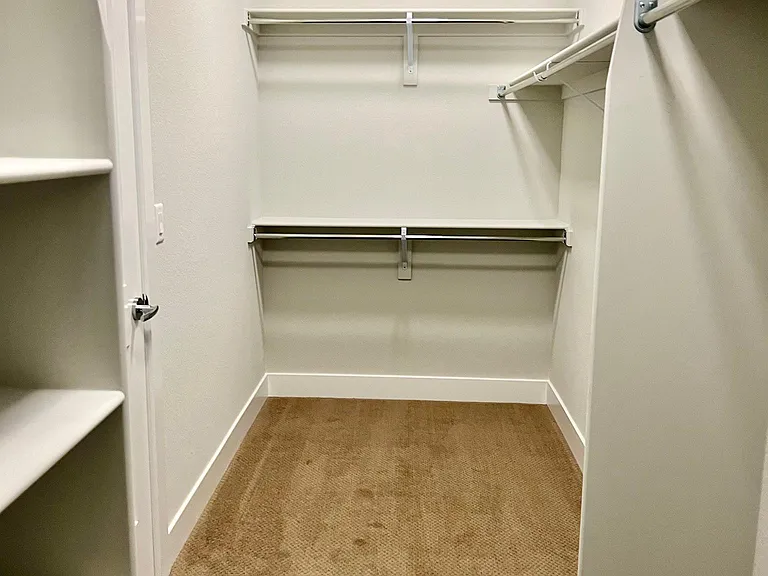 Large walk in closet of Master Bathroom.