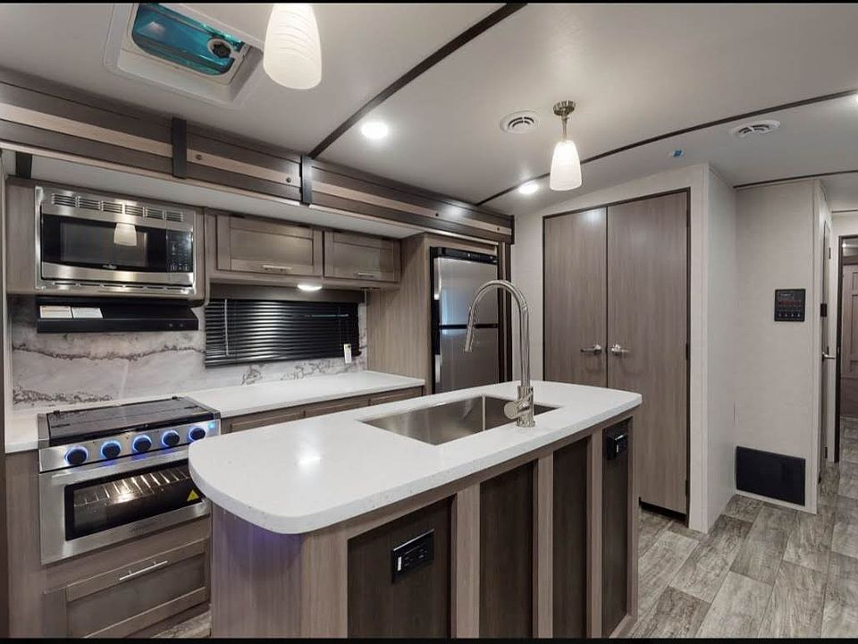 Fully furnished with cooking wear and utensils.