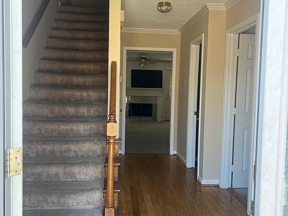 Entrance showing Hallway and Stairs leading to upstairs