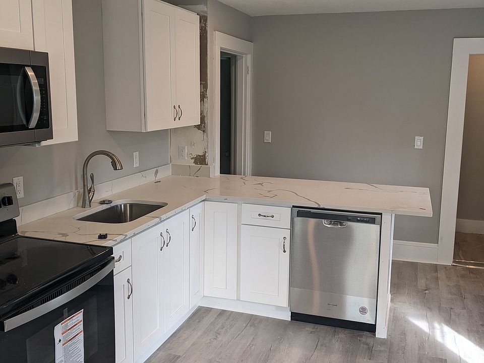 Full appliancekitchen with pantry area for additional storage