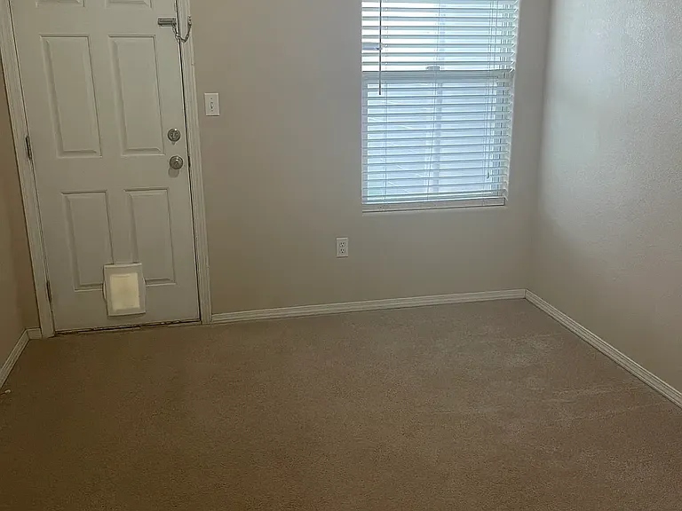 2nd bedroom that has access to the backyard