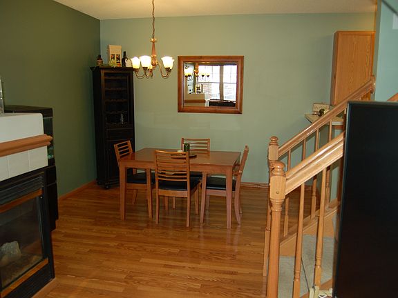 Large dining room with wood laminate floors