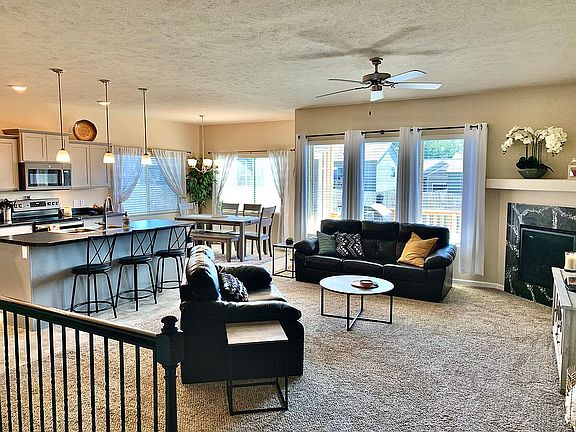 Open living/dining/kitchen. 