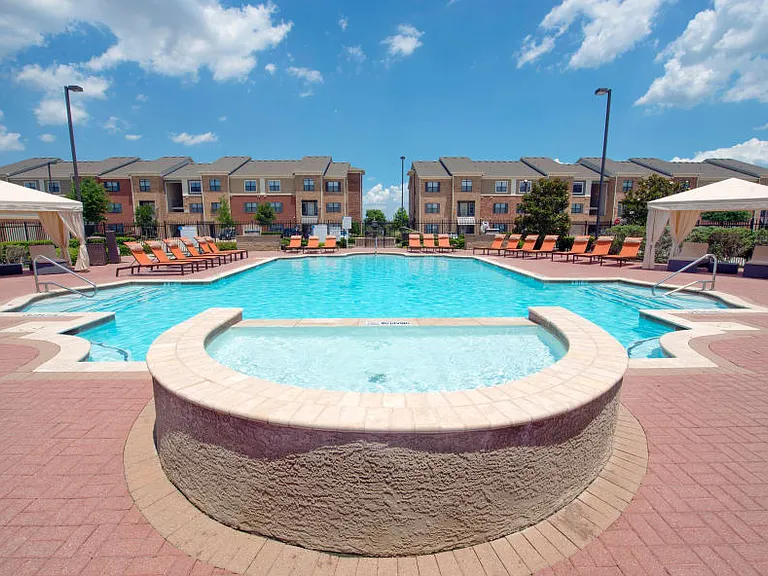 Resort Inspired Pool with Sundeck and Cabanas.