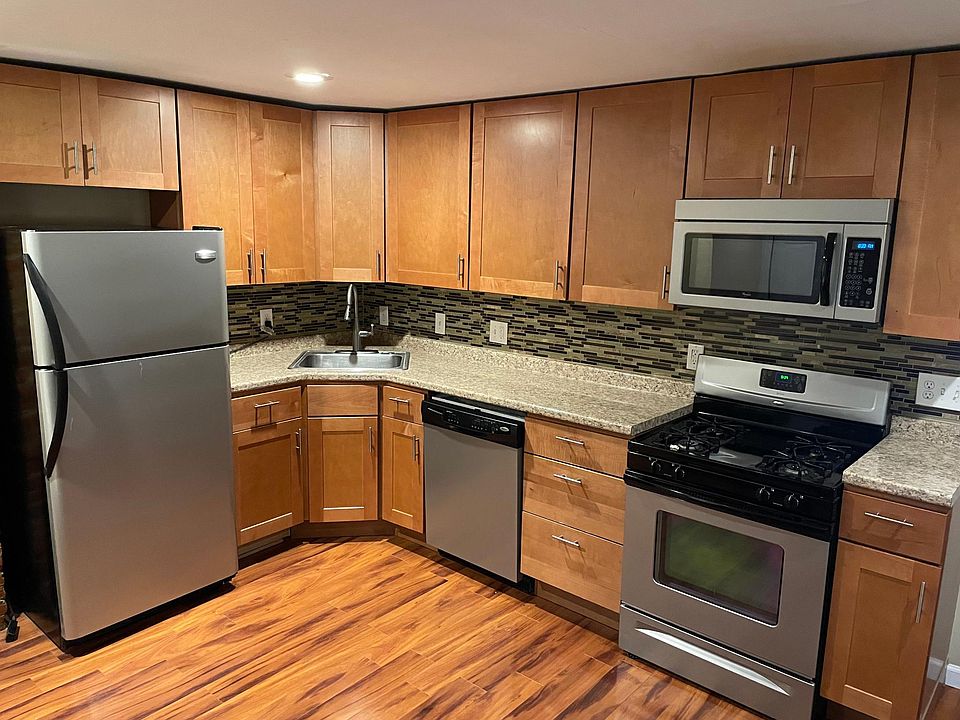 All appliances included!! Funky backsplash and newer maple cabinets.