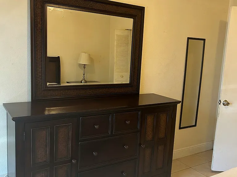 brand new bed set with queen bed, 2 night stands, and dresser with mirror