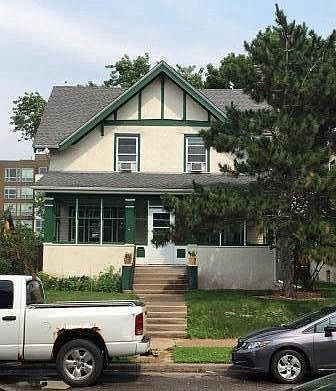 Well-maintained 1911 Arts&Crafts style house with stucco.