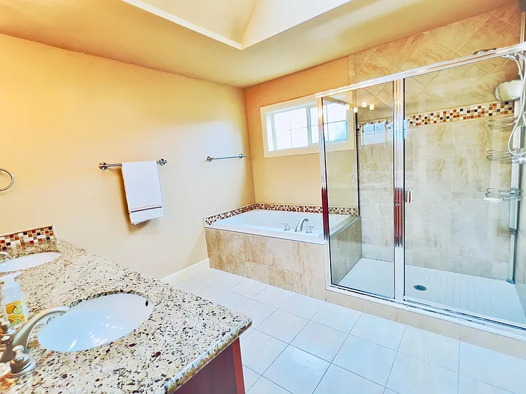 Master bedroom with walk-in shower