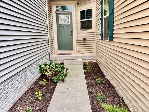 Front entry with walkway leading to the main door