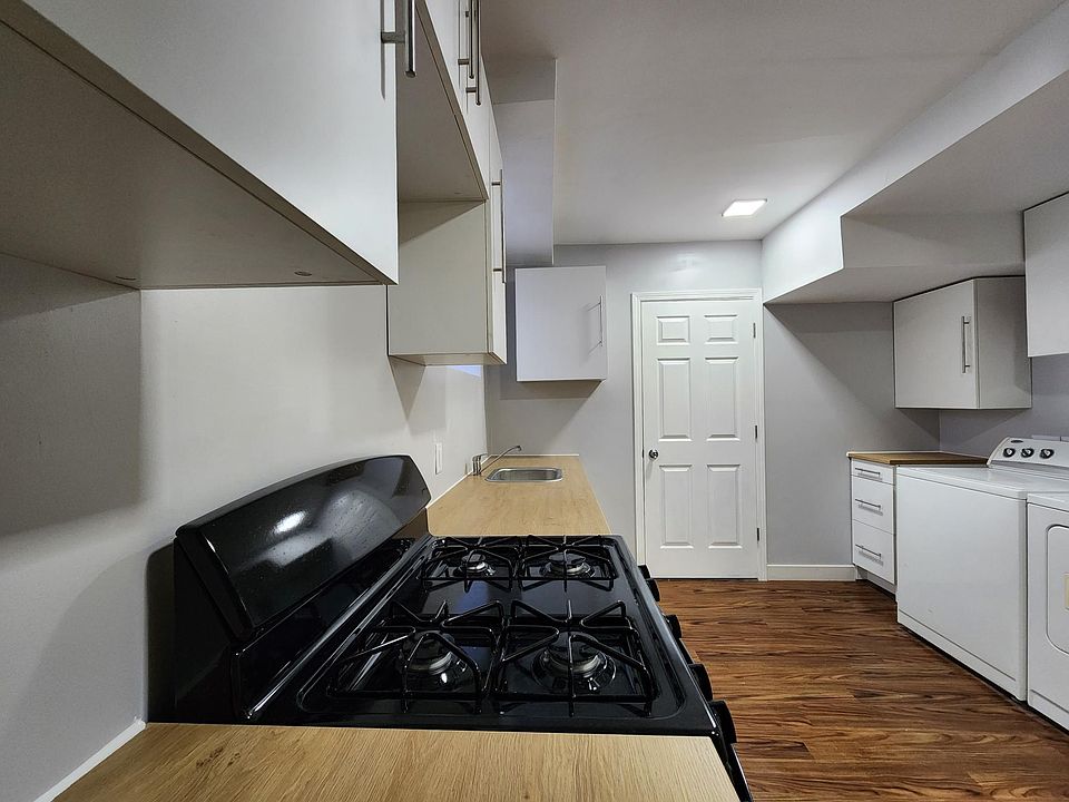 Kitchen leads to Storage Room 2