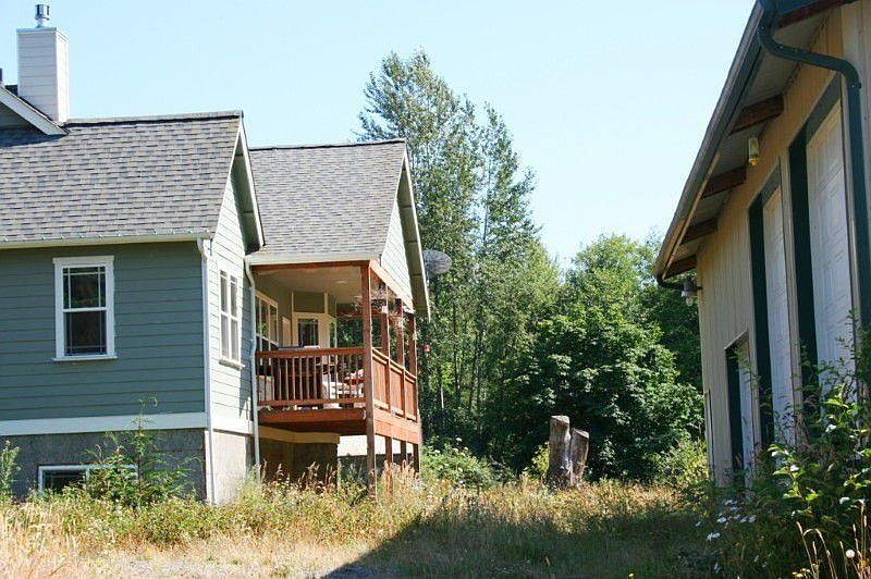 Porch off the back to enjoy your acreage