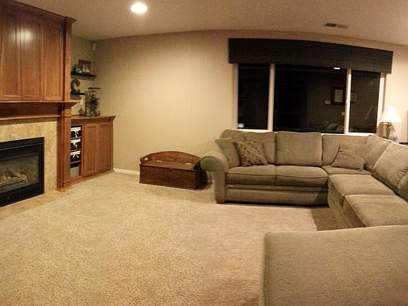 den w/ built in cabinets