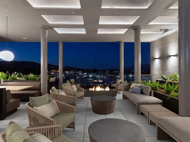 5th Floor Sky Deck with lounge seating, fire pit, and views