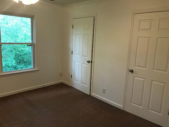 Spacious bedroom with professionally cleaned carpets and double closets