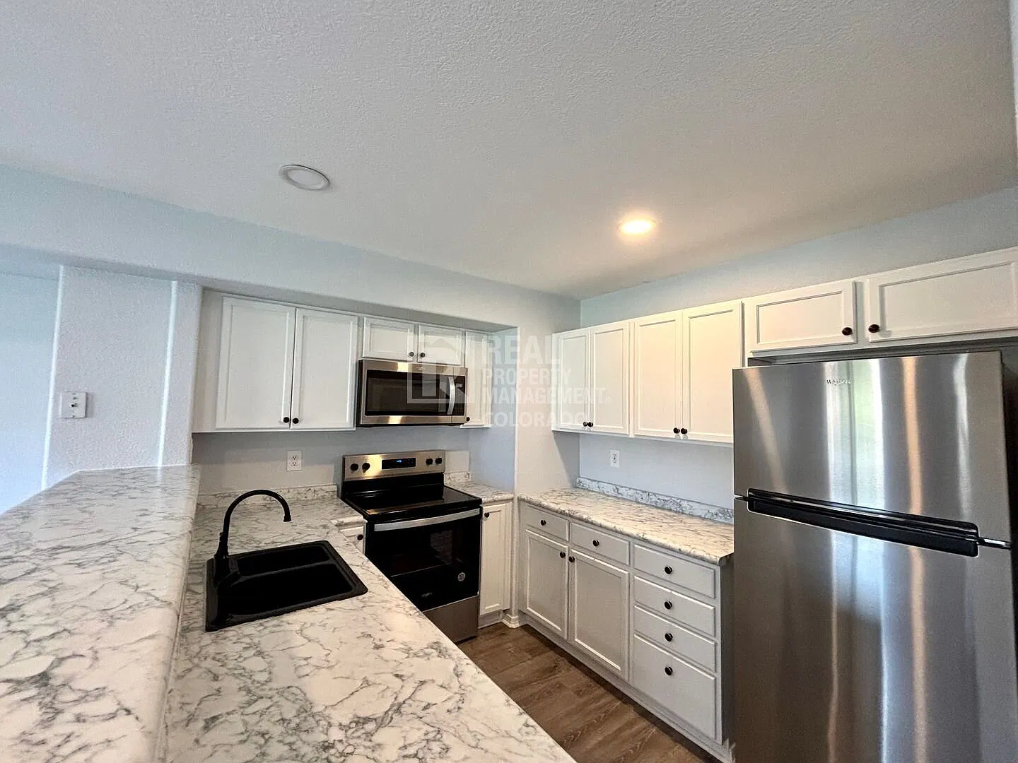 Beautifully Updated 3-Bedroom Townhome in a Central Location — Photo 3