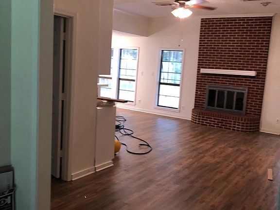 Den with cabinets/ fireplace not to be used