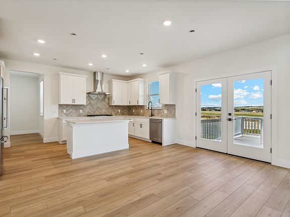 The kitchen and breakfast area have large windows that let in great, natural light.