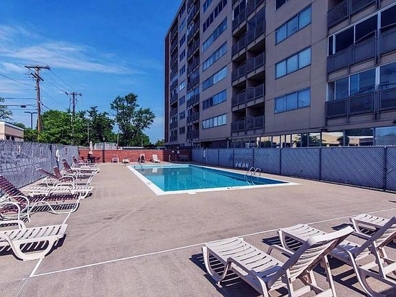 Large Swimming Pool with lounge chairs