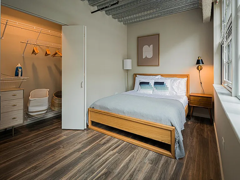 63 E Lake Apartments bedroom