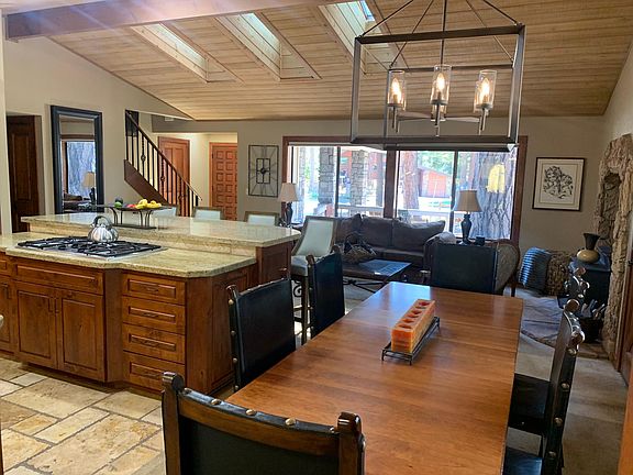 Living and dining rooms and partial kitchen view