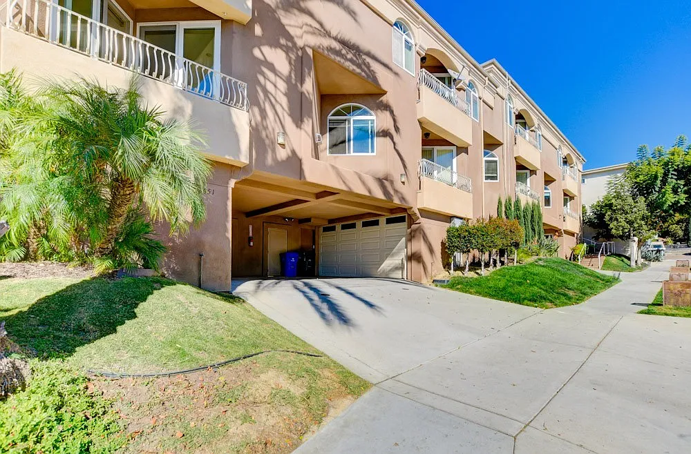 Harbor views! Double attached Garage with EV charging outlet! Balconies! Central AC! In Unit Wash... — Photo 3