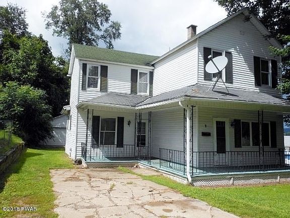 2-Front of House and Driveway