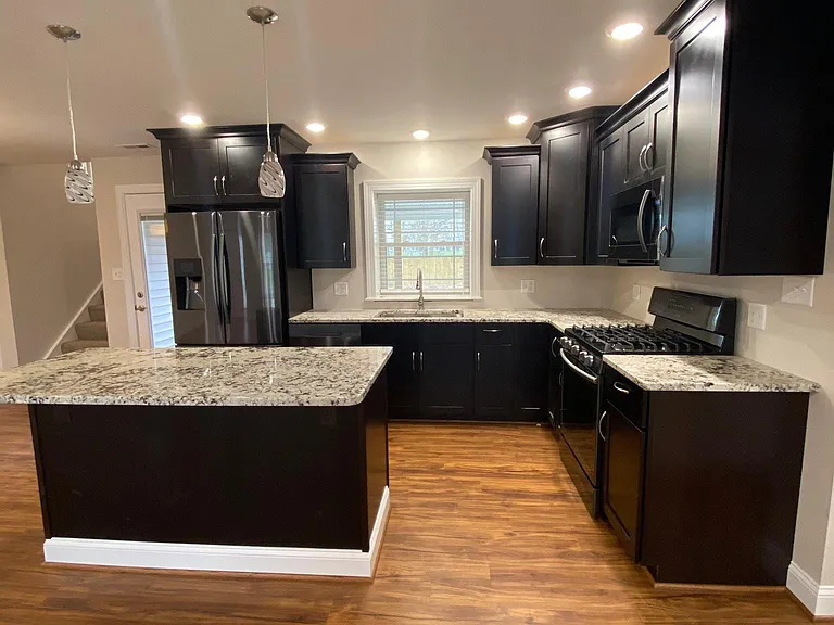 Mocha Kitchen with granite countertops and all new appliances