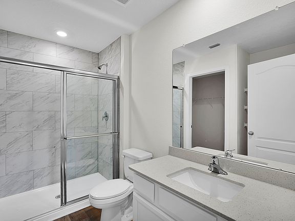 This incredible bathroom is the perfect place for guests to get ready in the mornings