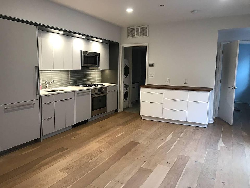 Kitchen and dining area with custom built-in storage